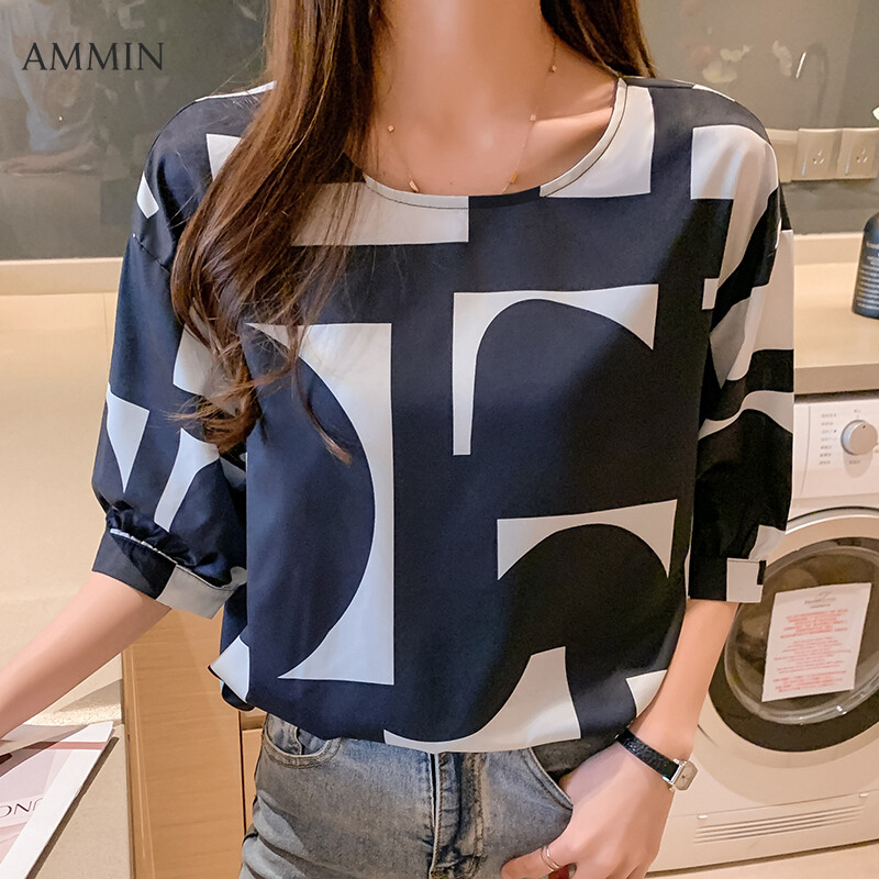 AMMIN Tops 2021 summer new style irregular pattern printing short-sleeved fashionable elegant temperament blouse women's Korean version of simple round neck printing light mature design all-match 